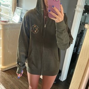 Olive green Hart and Huntington tattoo company zip up hoodie.